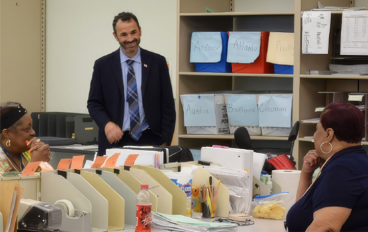 Danny Werfel in office with staff